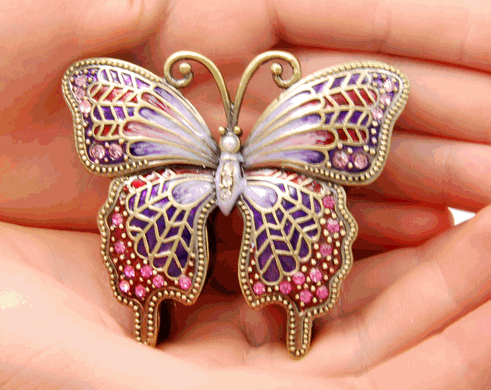 Purple Butterfly Cremation Keepsake shown in hands